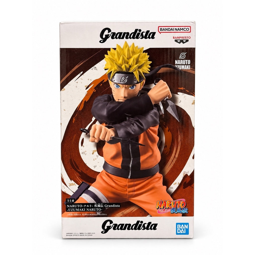 Front of the Banpresto NARUTO Shippuden Grandista Naruto Uzumaki box showing Naruto with crossed arms and a kunai in each hand.