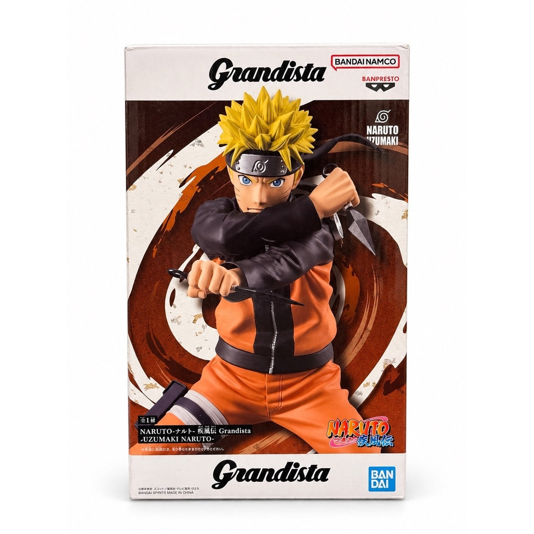 Front of the Banpresto NARUTO Shippuden Grandista Naruto Uzumaki box showing Naruto with crossed arms and a kunai in each hand.