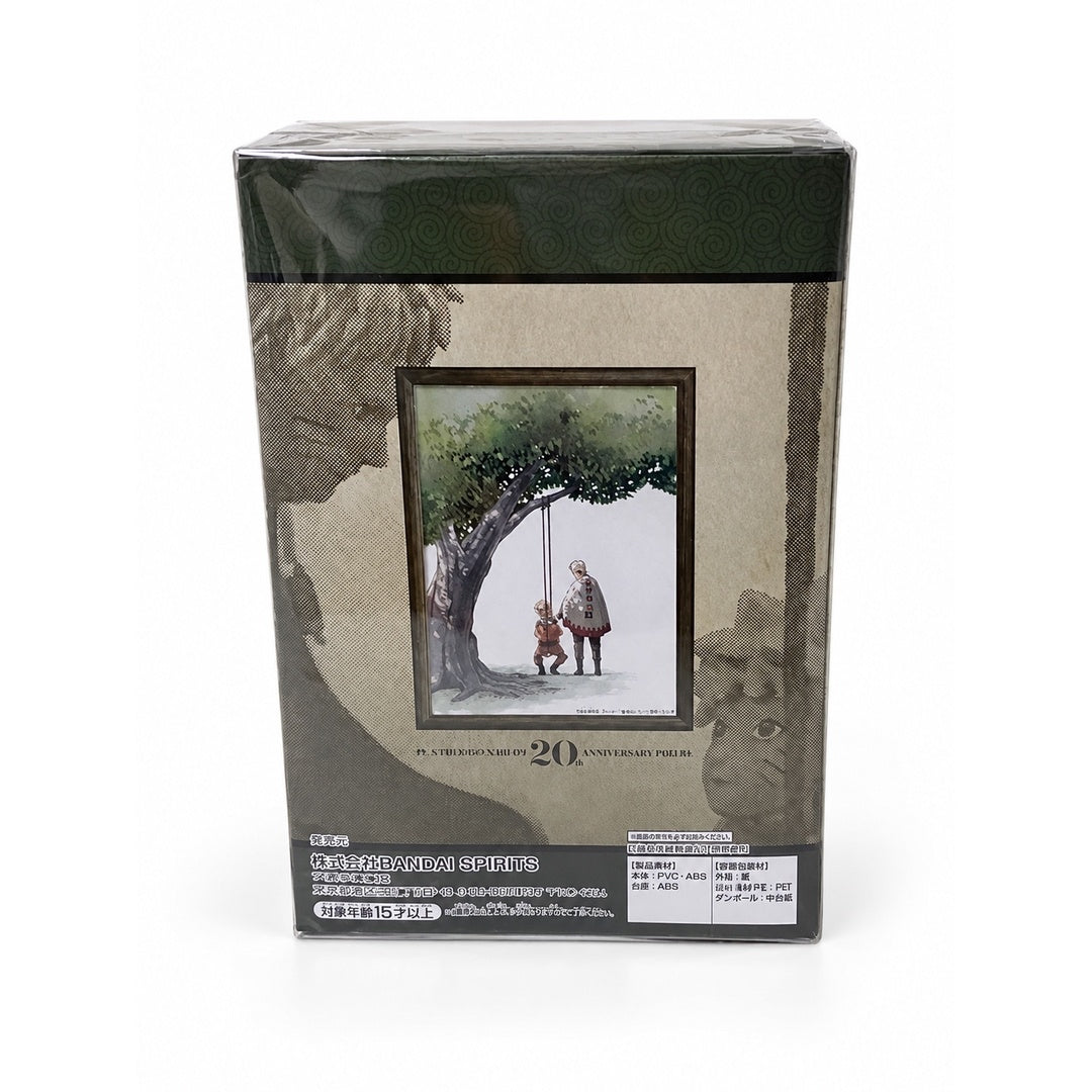 Back of the Naruto Hokage figure box featuring framed 20th anniversary artwork of adult and young Naruto beside a tree swing.