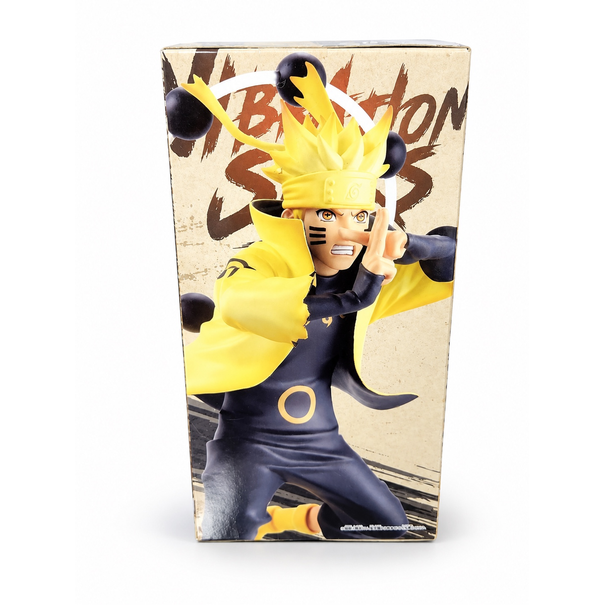 Side panel of the Naruto V figure box featuring a close-up of his determined expression, yellow cloak, and hand sign.